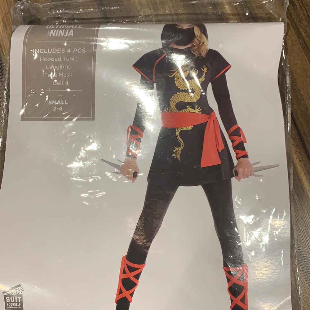 Women's Ninja costume small 4 pieces hooded tunic, leggings, face mask and belt.